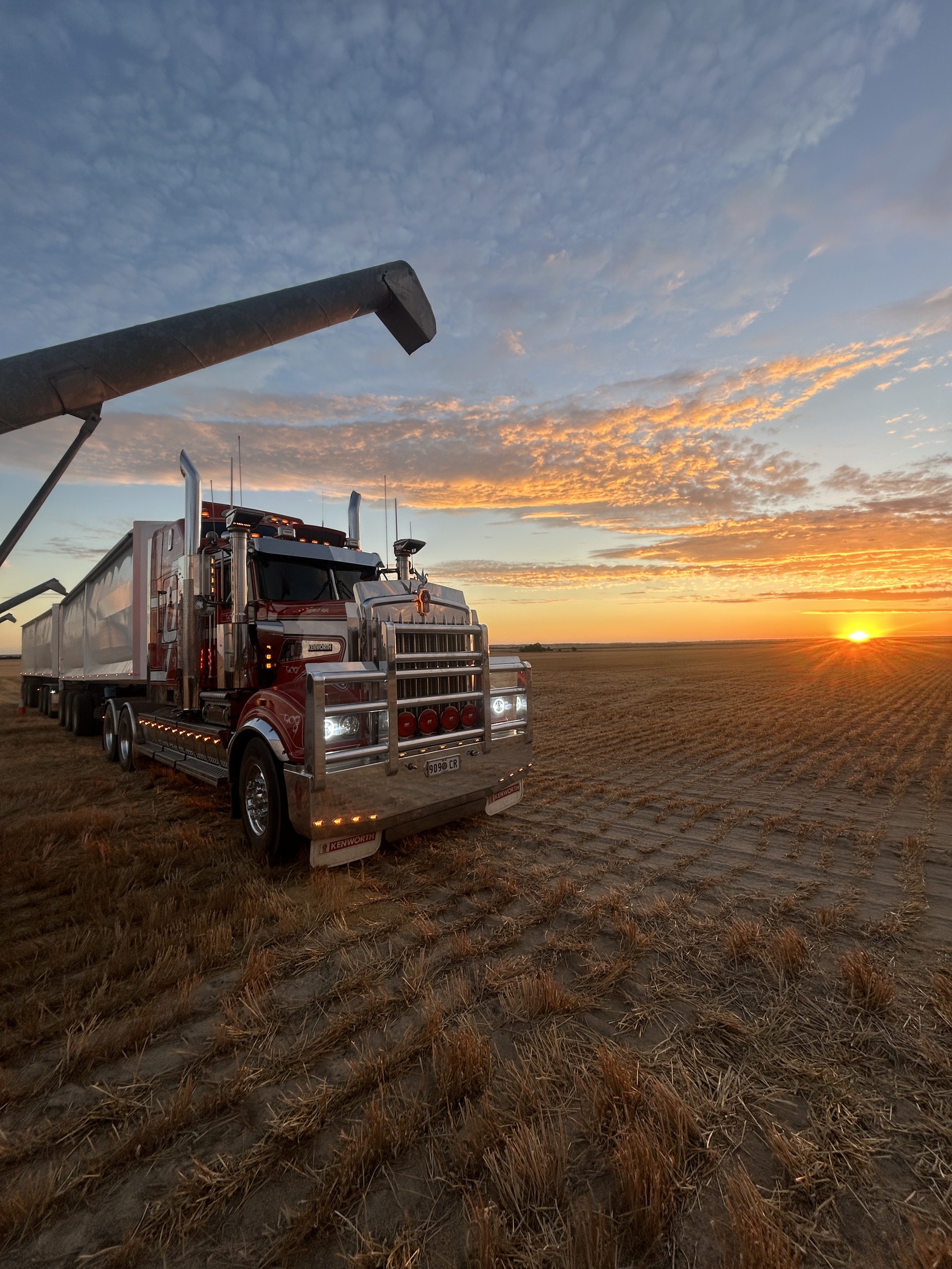 Kenworth road train at sunset